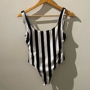 Size small, woman’s  high rise one piece